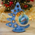 blue Christmas tree with a bauble and stars