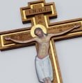 wooden wall crucifix with golden elements