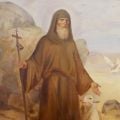 handpainted picture of st. Anthony the Great in the desert with a sheep and dove