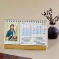 desk calendar with icons of saints for each month of the year 2027