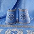 blue decorative priest vestment with embroidered Paschal patterns with Saints