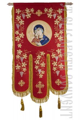 red brocade khorugv decorated with embroidery and an icon of theotokos