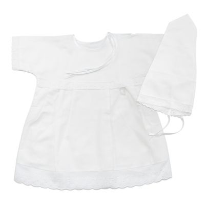 girls christening gown with a bonnet decorated with lace