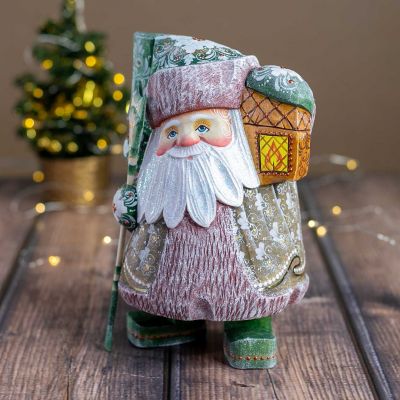 Carved Wooden Santa with holding a Lantern & a Staff
