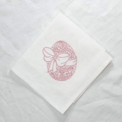 Easter napkin with an embroidered egg in a bow