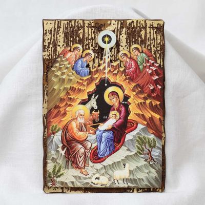 wooden graved icon of the Nativity of Christ