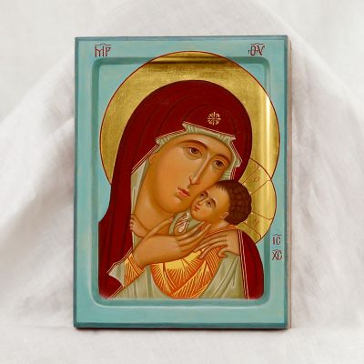 Acrylic icon of the Mother of God with blue background