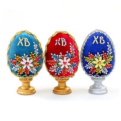faux velvet eggs on a stand with beads and embroidery