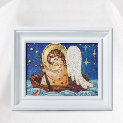 handmade picture of grounded semi-precious stones of an angel in a boat