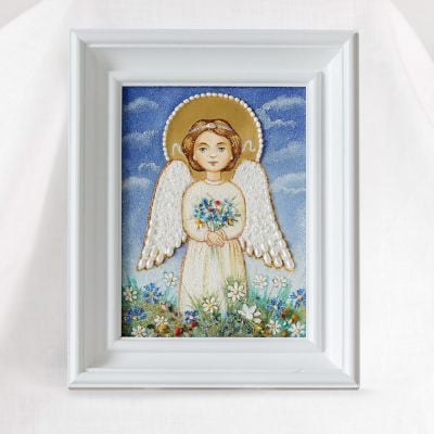 handmade from grounded semiprecious stones picture of an angel
