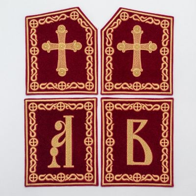 red and golden set of tablets for bishop