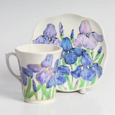 Cup and a saucer set with irisies