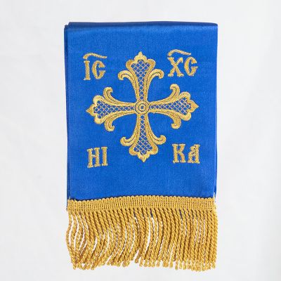 blue bookmark for the holy gospel with a golden embroidery and fringe