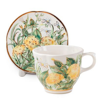 handmade ceramic tea cup and saucer with dandelions and chamomiles
