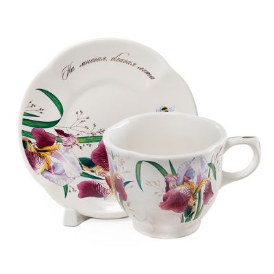 ceramic tea cup and a saucer with lily-of-the-valley picture