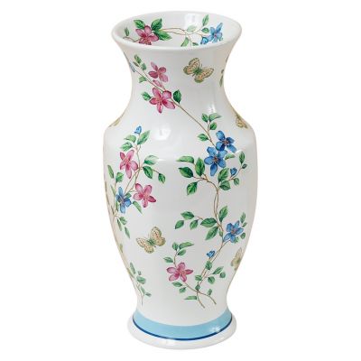 ceramic vase with flowers and butterflies inside and out