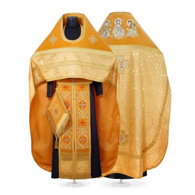 yellow velvet and silk priest vestment with embroidered patterns and saints