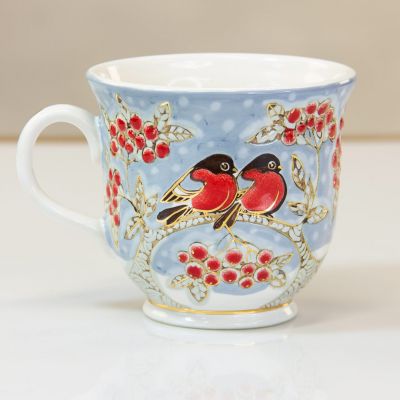 ceramic cup and saucer set with bullfinches and rowan