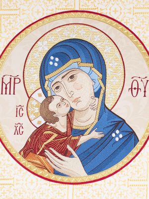 white church banner with embroidered icon of Mother of God