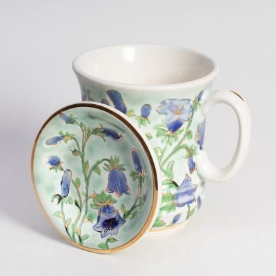 tea cup with a top british wild flower