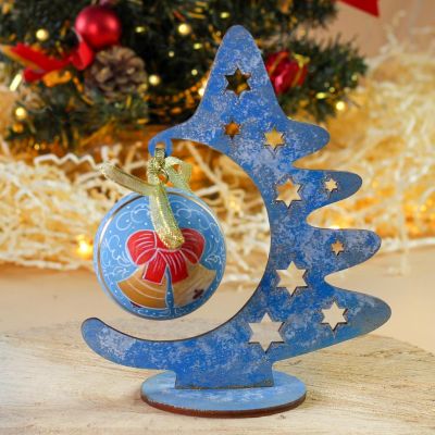 blue Christmas tree with a bauble and stars