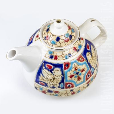 handmade teapot with eagles