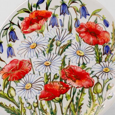 hand-painted ceramic cup and saucer set painted with poppies, chamomiles and bluebells