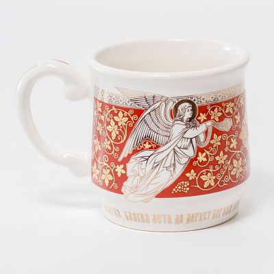 ceramic cup with angels and grapes pattern and gold elements
