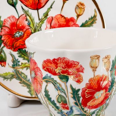 ceramic cup and saucer set with poppies and gold elements
