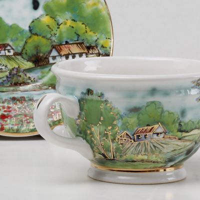 beautiful gift cup and saucer set with handmade paintinhs