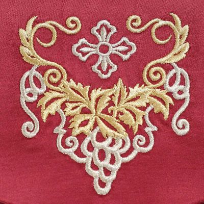 red case with embroidered grapes and a button