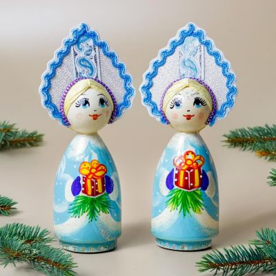 Blue Russian Doll in Kokoshnik with a gift box