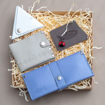 leather wallets and a purse as a gift