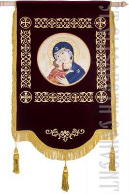 burgundy velvet khorugv with an embroidered icon of the mother of god