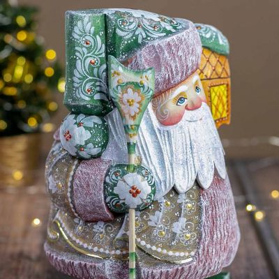 Carved Wooden Santa with holding a Lantern & a Staff