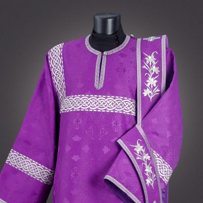 purple deacon vestment with embroidered lilies and crosses