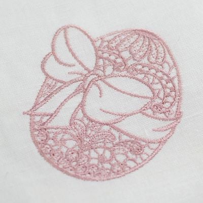 Easter napkin with an embroidered egg in a bow