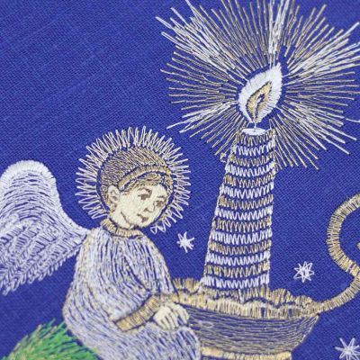 Blue Christmas Table napkin with embroidered angel and a candle