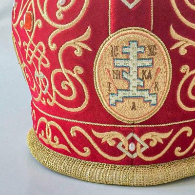 red velvet mitre with embroidered icons of saints
