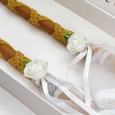 orthodox wedding accessories in a box with candles and towels