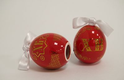 ceramic red bell with gold inscription