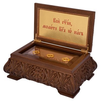 wooden carved reliquary with crosses