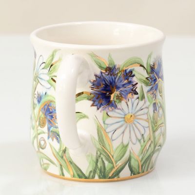 Handmade ceramic mug with cornflowers