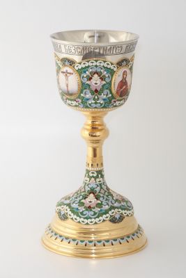 brass chalice with enamel patterns and icons medallions decals