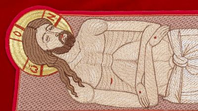 red velvet shroud with embroidered grapes and troparion