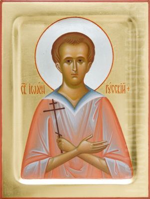 painted icon of St John the Russian, the background is covered with gold leaf