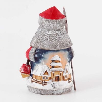 carved Santa with a church on the coat