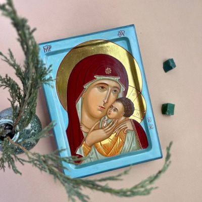 Acrylic icon of the Mother of God with blue background