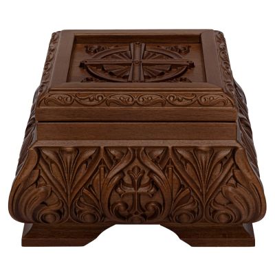 wooden reliquary with carved cross
