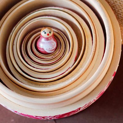 pink wooden matryoshka doll round